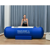 Macy-Pan ST701 hyperbaric oxygen therapy chamber with a smiling woman promoting wellness and recovery.